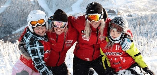 Výuka lyžování nebo snowboardingu